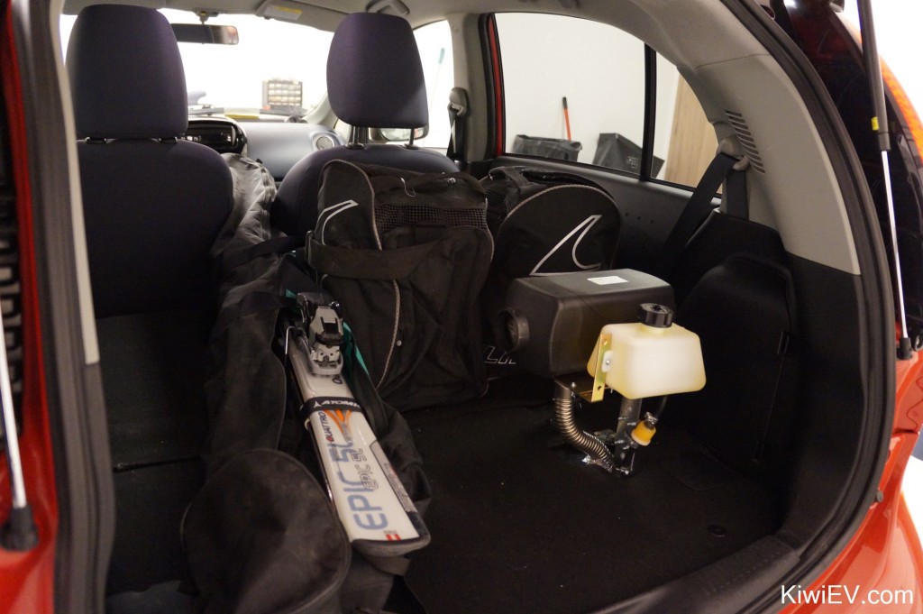 skis inside the electric car