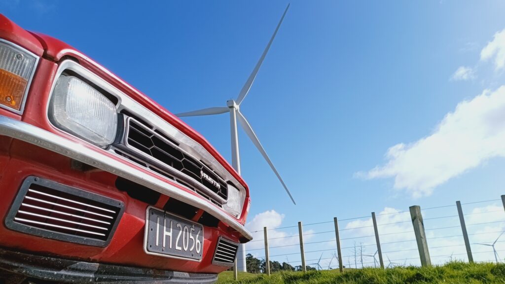 Austin Allegro in front of a wind turbine